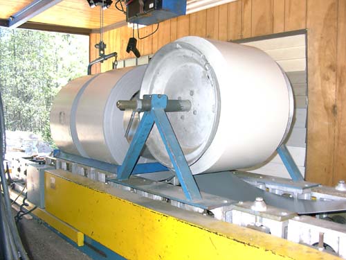 0131 - three 900 lb rolls of siding