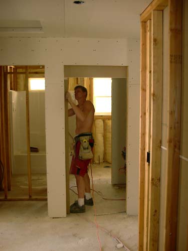 0133 - sheetrocking hall bath