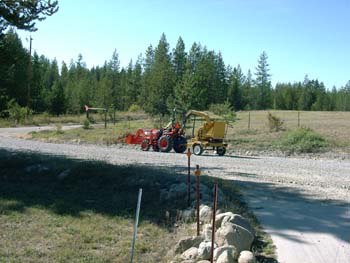 0240 - Dad towing the chipper